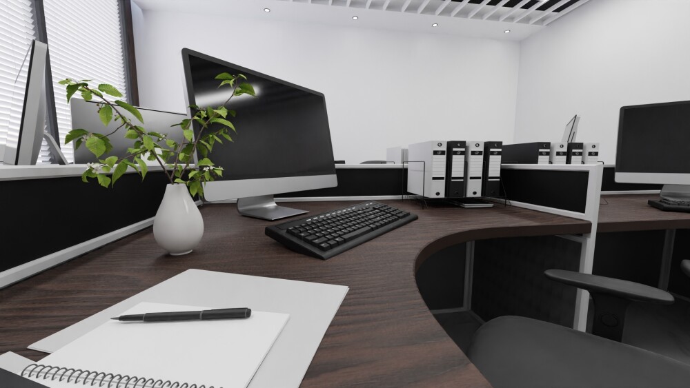 在宅ワークに適したワークスペースの室内イメージ。造作デスクに大型モニターとキーボードを配置し、書類やファイルを整理できる収納を備えた仕事空間。自然光が入る落ち着いた環境で、集中力と作業効率を高めるリモートワーク向けの住まい設計事例。